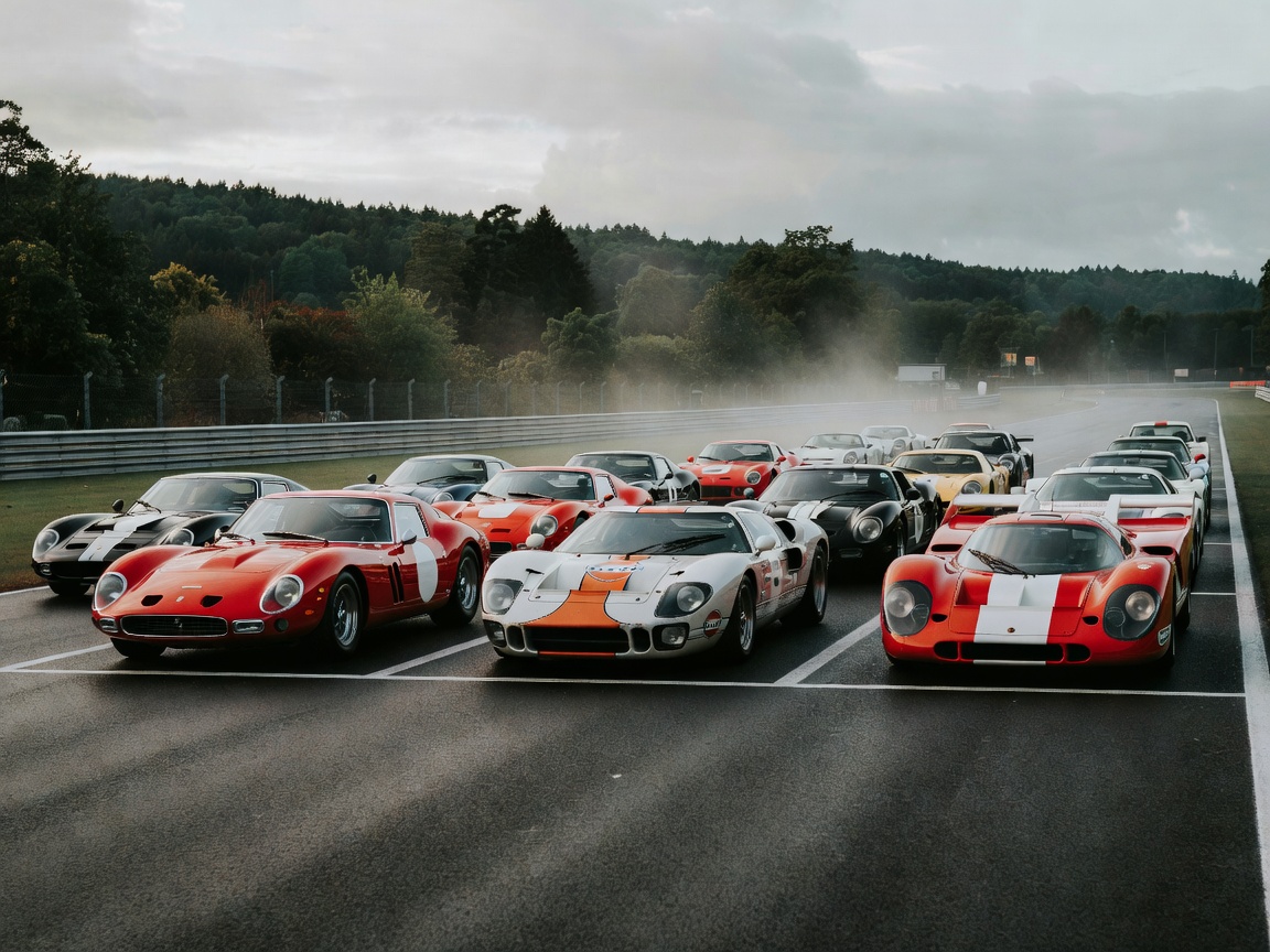 Atmospheric image representing historic racing cars gathered on the grid at Spa Classic